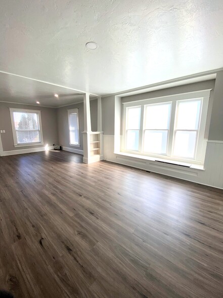 Open Living Room Area - large! One space for living room, one for office, playroom, etc. - 219 W Clark St