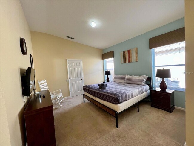 Building Photo - 8127 Fan Palm Way