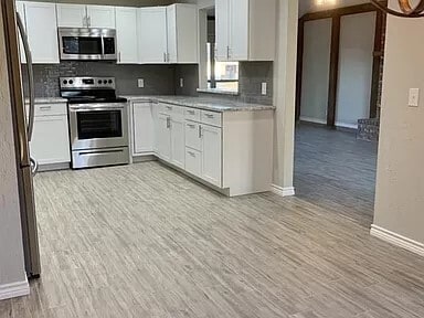 Building Photo - Spacious 3-Bed, 2-Bath Home | 1,560 Sq Ft ...
