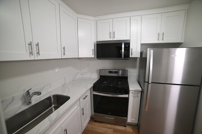 Building Photo - Newly remodeled studio in a gated building with pool and laundry room!