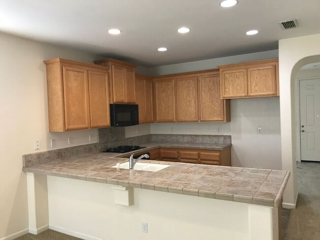 Building Photo - 3 Bed| 2 Bath | 1540 SF | 2 Car Garage | Single Story | Tenant pays $175 monthly for WS&G