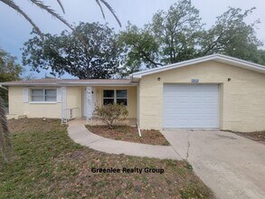Building Photo - Spacious 3 bed, 2 bath home with fenced yard, screened porch, and oversized garage just minutes f...