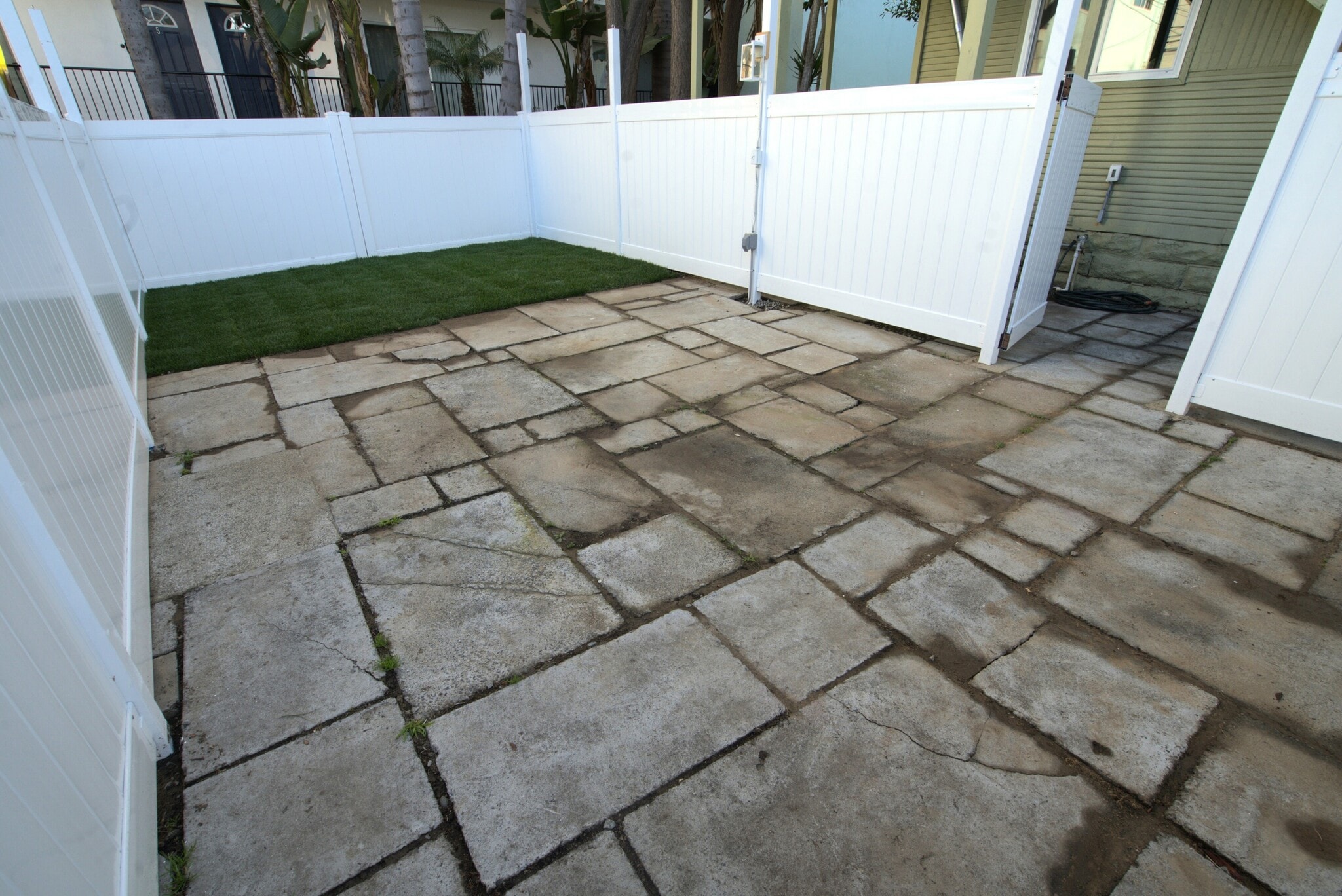 Private fenced backyard only for this unit's use - 1123 E Ocean Blvd