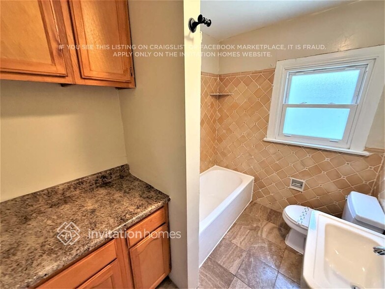 Building Photo - 6046 6th Ave