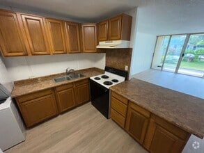 Building Photo - "Cathedral Point" Spacious Ground-Floor 1-...