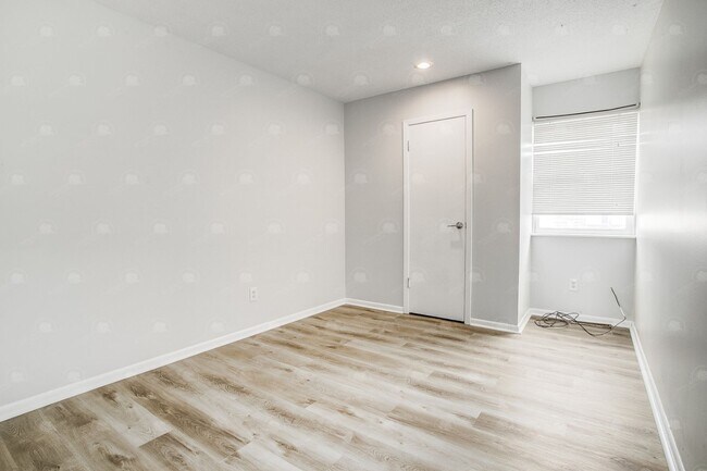 Building Photo - **Spacious 3-Bedroom Townhome with Partially Finished Basement and Off-Street Parking**