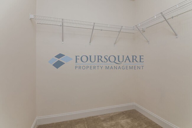Building Photo - Charming End Unit Townhome With Back Patio...