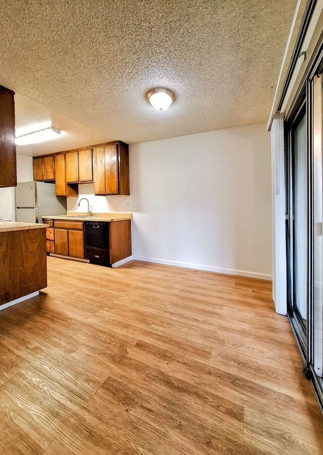 Building Photo - Beautiful 2bd Condo In Gated Community With Pool, Gym, and On-site Laundry