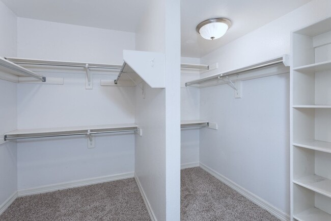 Building Photo - Gorgeous Mediterranean-style condo located...