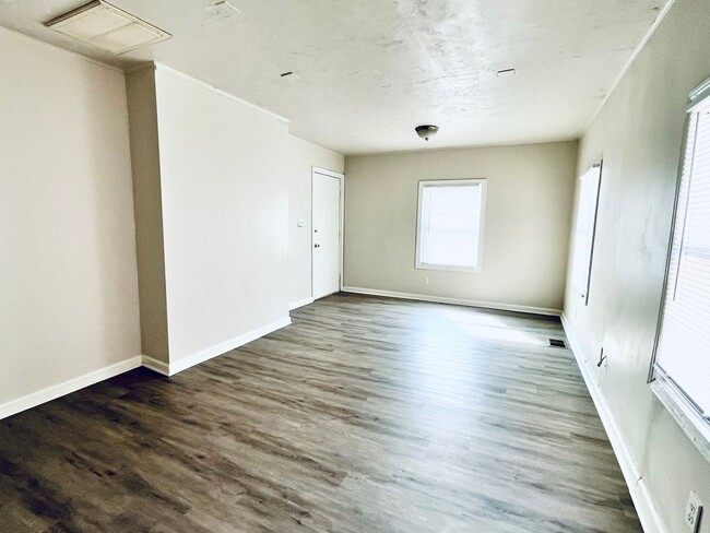 Building Photo - Updated Three Bedroom close to Churchill D...