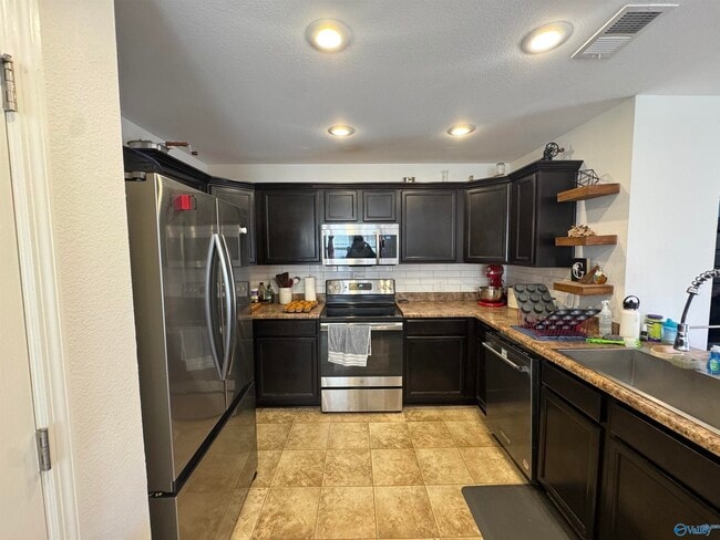 Building Photo - 709 Oak Cove Ln NW