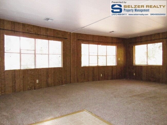Building Photo - Roomy 2 bd. mobile w/ big yard in a countr...