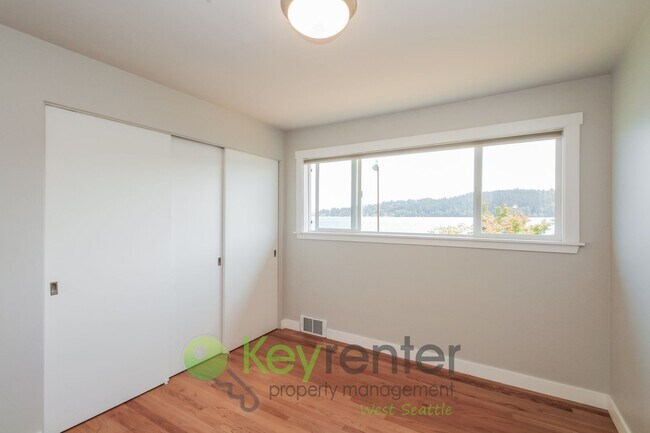 Building Photo - Waterfront Elegance with Private Dock and Designer Finishes