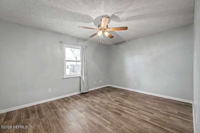 Building Photo - 8472 Bandera Cir W