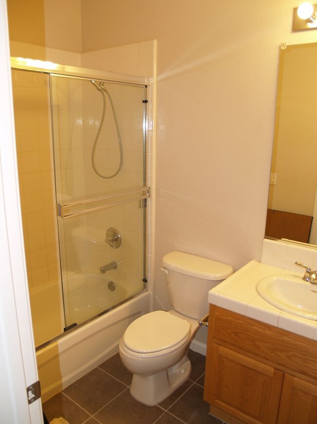 Building Photo - Private Street Entrance! Attached Garage! ...