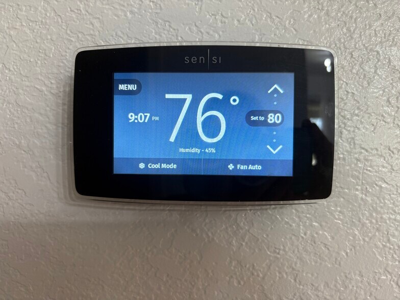 Dual-zone smart thermostat with separate controls upstairs and downstairs - 4208 SW Fieldstone Blvd