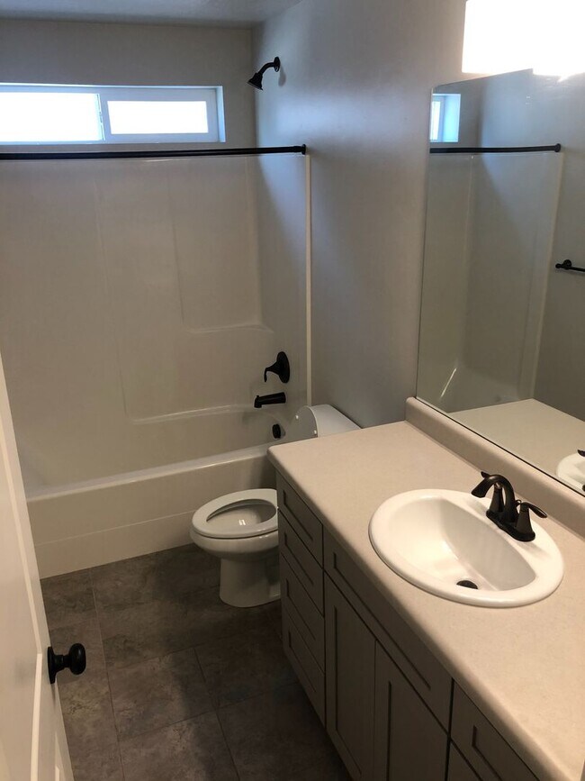 Building Photo - AMAZING HOME IN SOUGHT AFTER EXCHANGE DEVELOPMENT W/ 2 CAR GARAGE