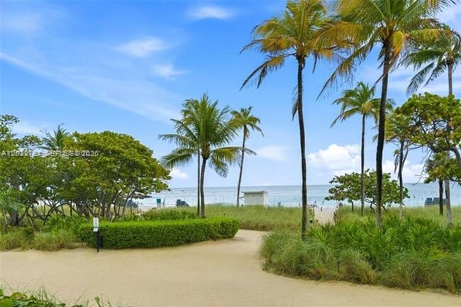 Building Photo - 10275 Collins Ave