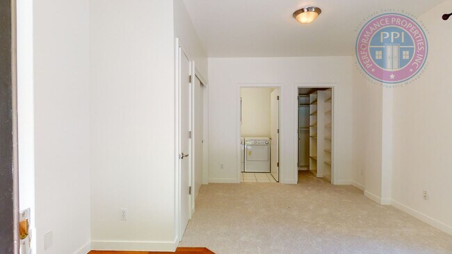 Building Photo - Riverfront Location, Luxury Townhome - End Corner Unit, Two En-Suites, Attached Garage