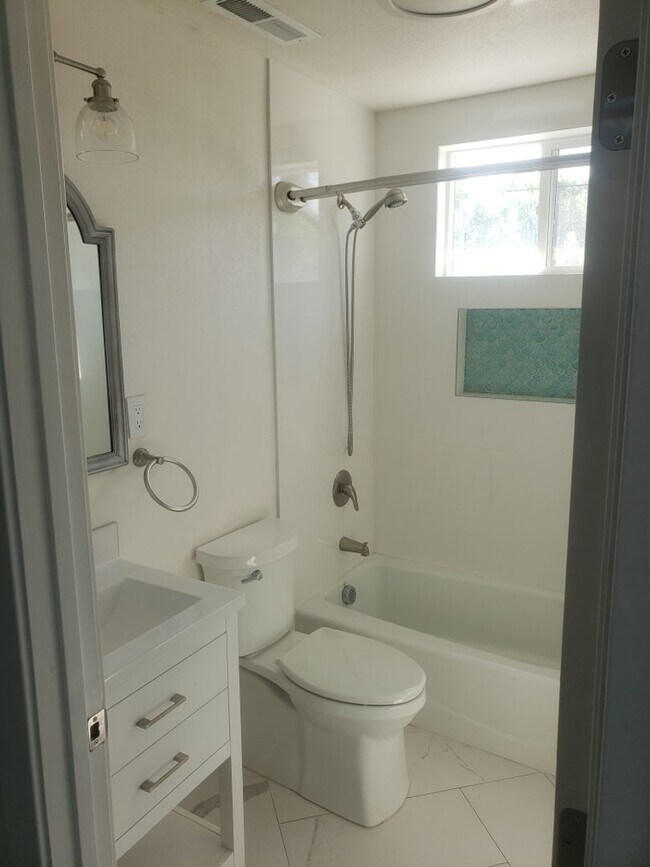 Building Photo - Beautifully Renovated Home with Updated Kitchen and bath, paint, and flooring! FREE SOLAR TOO!!!!