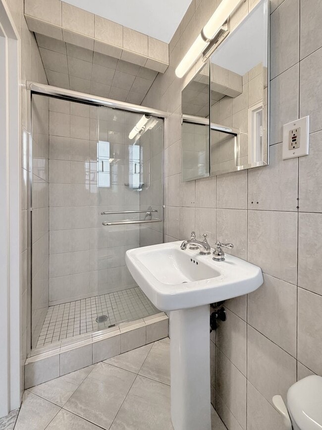 Building Photo - The Leslie — A Private Garden Enclave for the Modern New Yorker