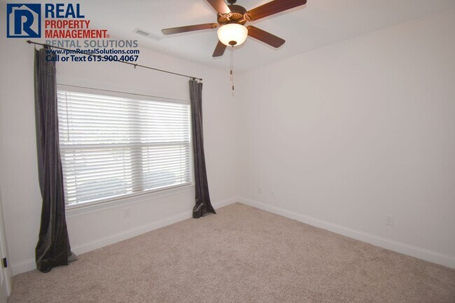 Building Photo - All brick 4 bedroom home plus Bonus room! Garage and covered patio!