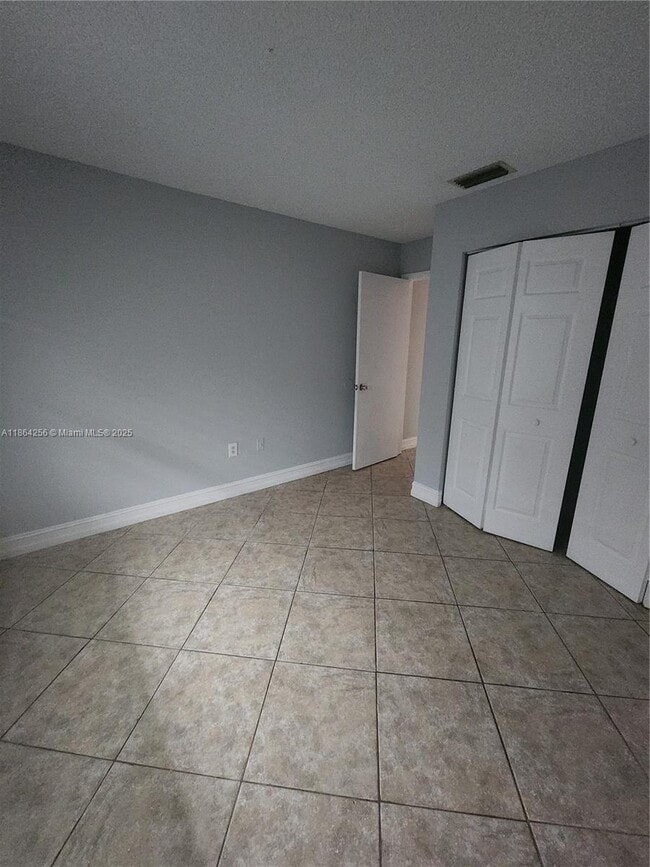Building Photo - 10960 NW 29th Ct