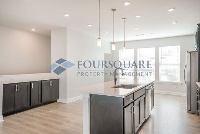 Building Photo - Spacious  End-Unit Townhome | Rear Deck & 2-Car Garage  | Near Brier Creek