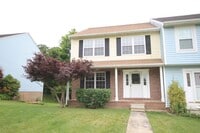 Building Photo - *Coming Soon*  Upgraded End Unit Townhome ...