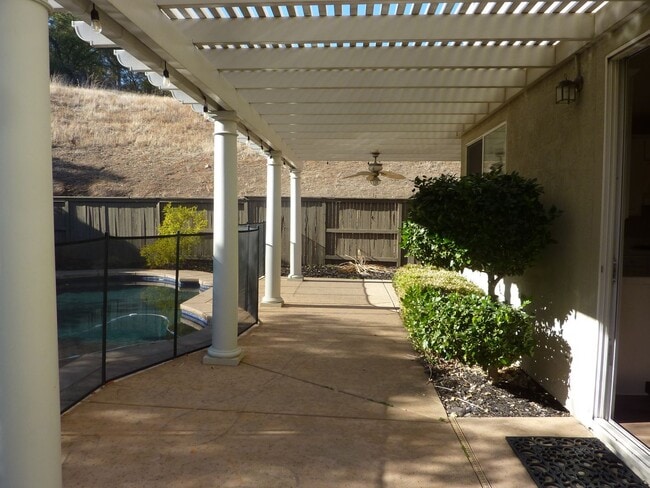 Building Photo - Stunning Single-Family House with a Backyard Oasis in a exclusive Gated Community of Serrano