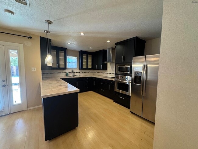 Building Photo - 4422 McNiel Ave