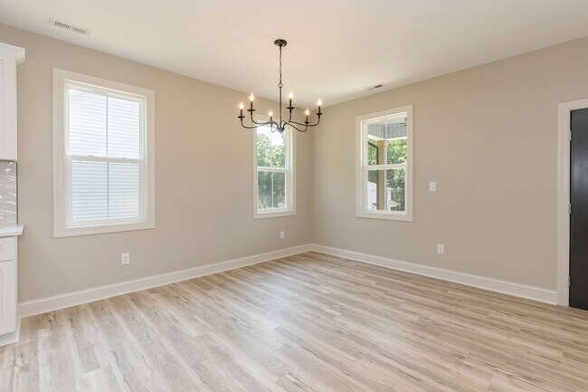 Building Photo - Comfort and Space with Easy Access to the ...