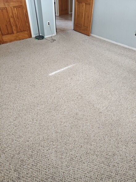 Primary Bedroom with freshly steam cleaned carpets - 32 Scooter Ln