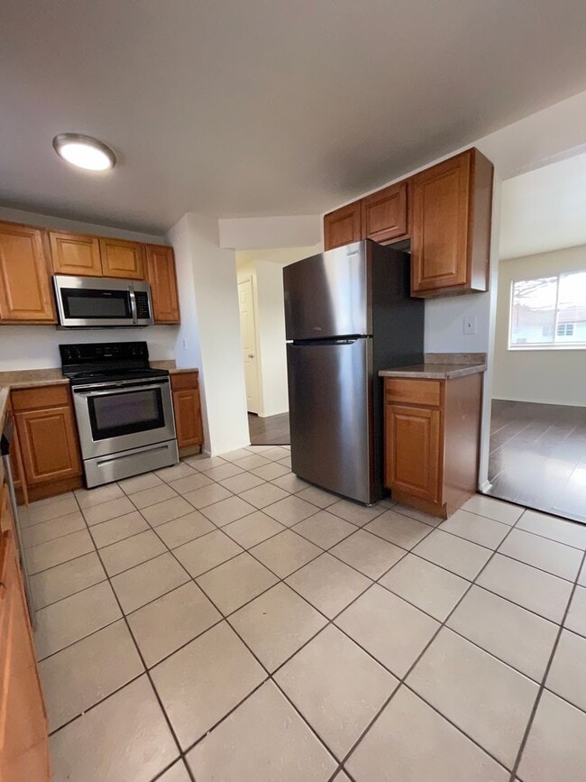 Building Photo - West Jordan Remodeled Four Bedroom; Garage; New Kitchen Cabinets; Fenced Yard; Central Air