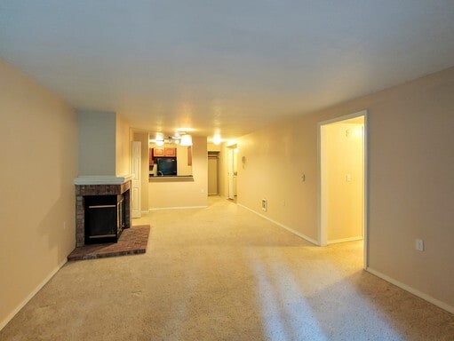Building Photo - Lovely Condo in the Woods - Deck - Carport - FP - Closets - WD/DW - Fitness Center - Pools