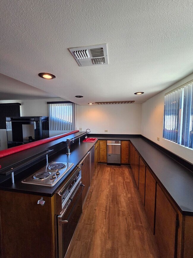 Building Photo - One of Kind 3 bed/2.5 bath home with 3 car attached garage located in BHC.