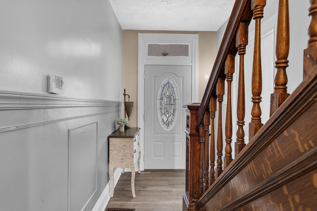 The home's front door and foyer. - 713 Clinton Pl