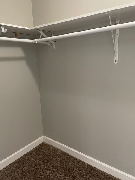 Walk in closet in master bedroom - 7960 Bobtail Ct