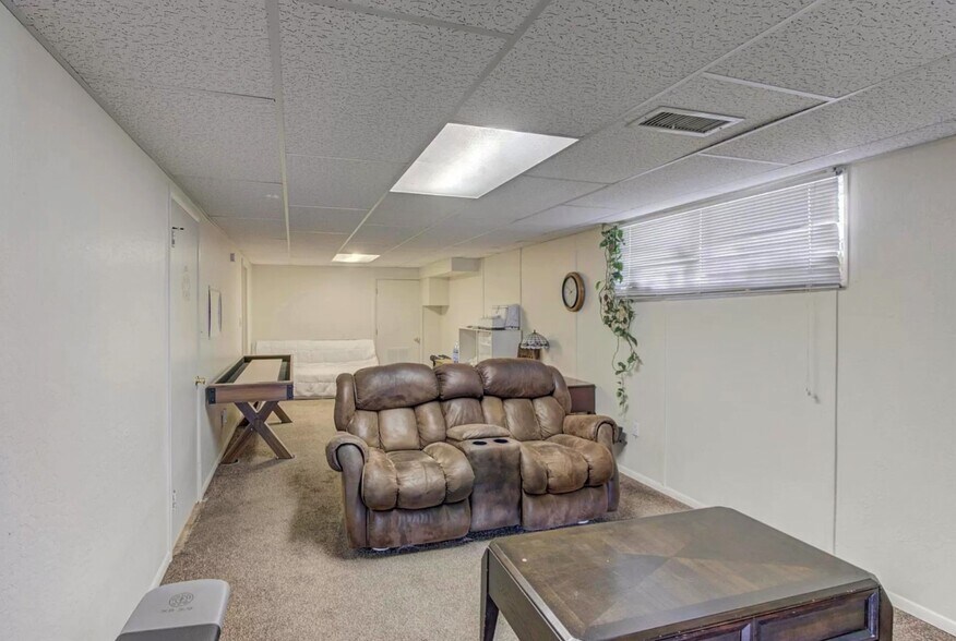 Downstairs: Wall has been added to create 2 separate rooms - 221 E Pine St