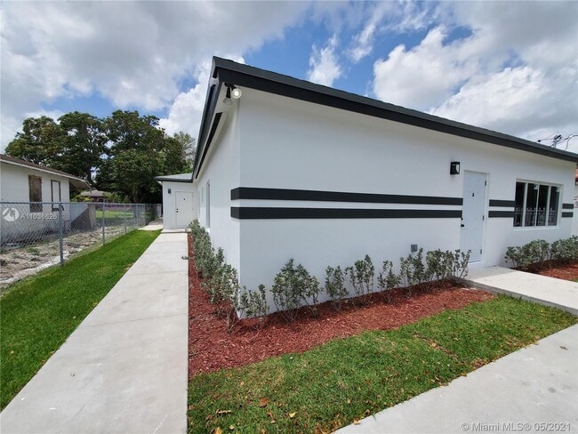 Building Photo - 8028 NW 11th Ave