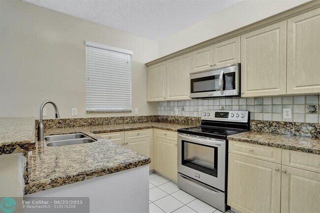 Building Photo - 6455 NW 78th Dr
