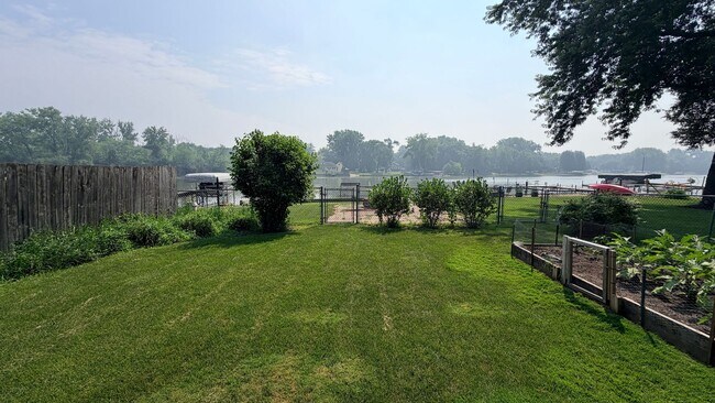 Building Photo - Riverfront Living on the Fox: 2 Bed, 1 Bath with Private Dock and Oversized Garage