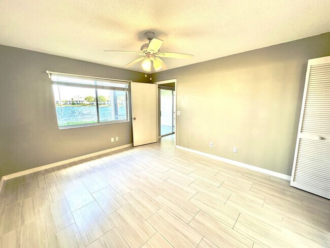 Building Photo - ** EMERALD LAKES ** 2 BED / 2 BATH CONDO - LAKE VIEW - CENTRAL NAPLES - ANNUAL RENTAL