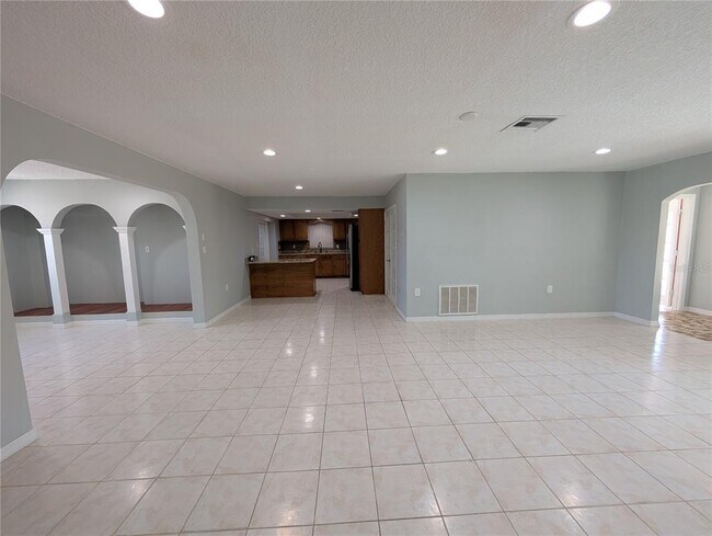 Building Photo - 6947 Bottle Brush Dr