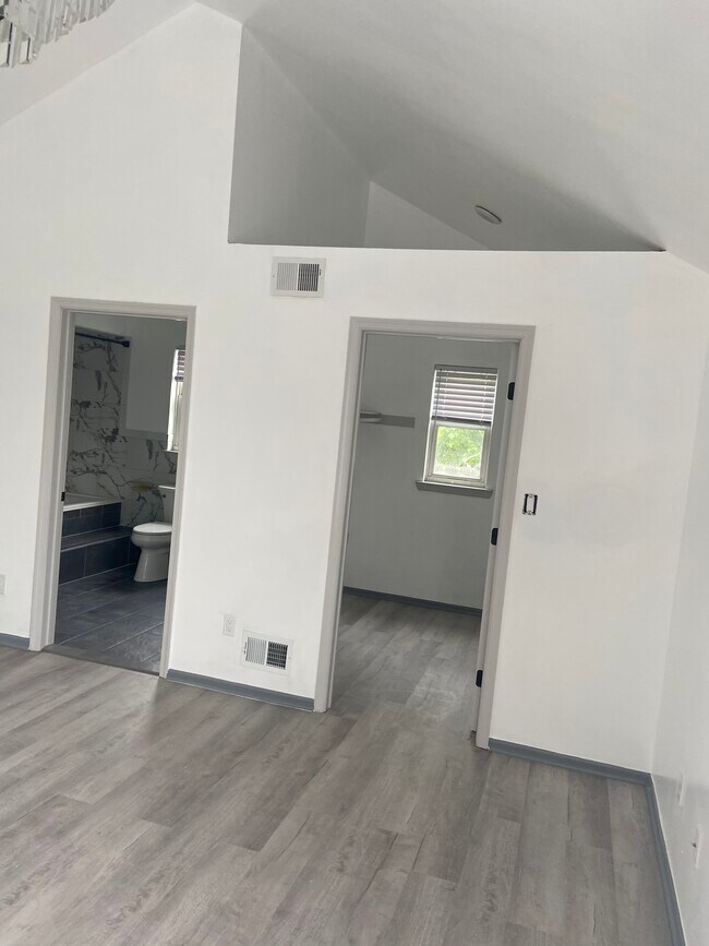 Master bedroom walk in closet and bath view - 114 Front St