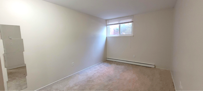Building Photo - 2-Bedroom Garden-Level Unit | Parking, Patio & Water Included