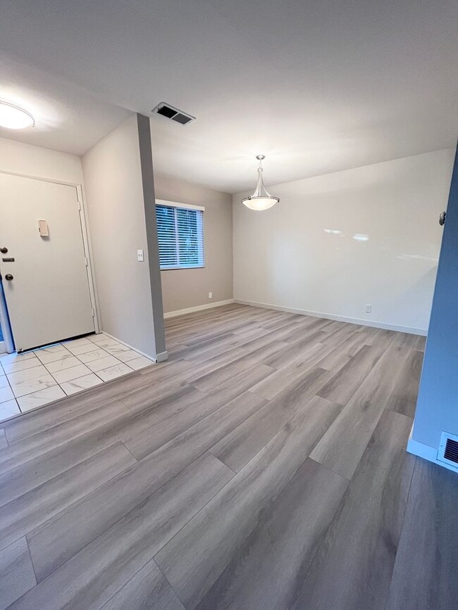 Building Photo - Bright, Cheery and Newly Renovated 2x1 behind Bon Air!