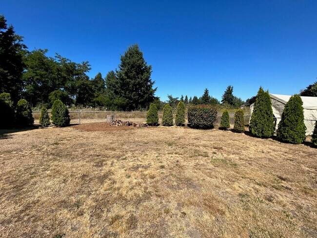 Building Photo - Rambler Fenced Backyard