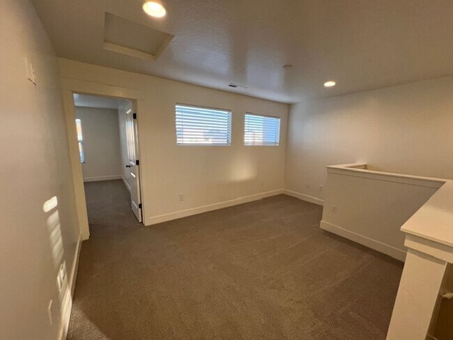 Building Photo - BRAND NEW South Desert Townhome with EVSE Outlet