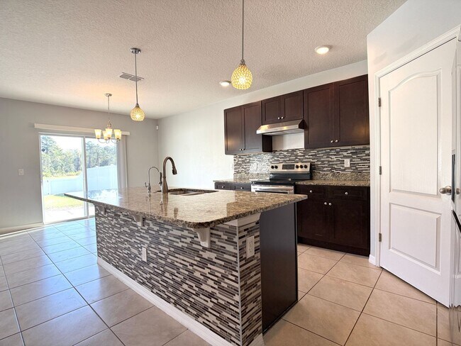 Building Photo - Move-In Ready • Lawn Care Included • Pet-Friendly!